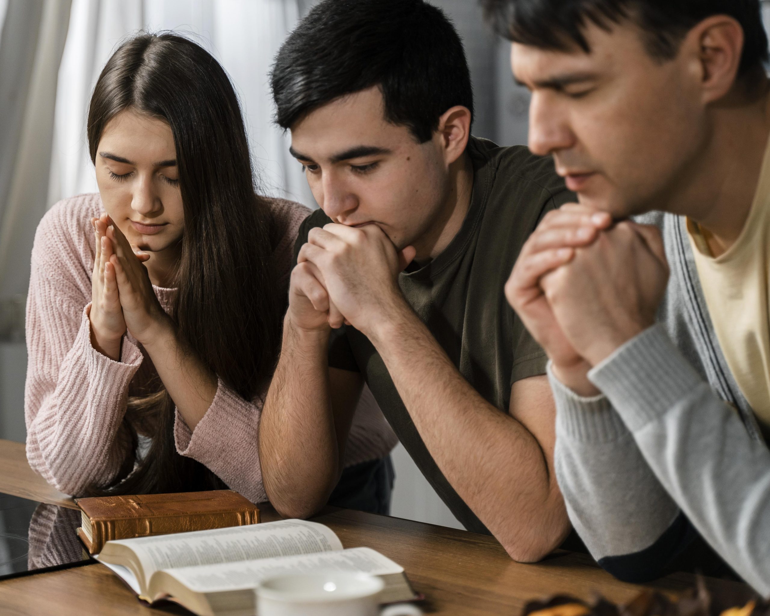 side-view-people-praying-together